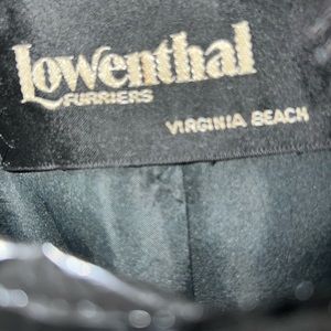 This designer Lowenthal mink coat is the perfect addition to any wardrobe.